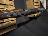 Krieghoff K-20 sporting.
standard engraving with black finish and gold line border,
30 Inch barrel.
like new in the factory case. - 5 of 12