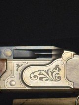 Krieghoff KX-5,
34 inch barrel.
Adj rib and comb.
Absolutely like new.
Release or pull trigger - 4 of 17