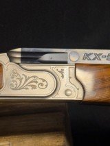 Krieghoff KX-5,
34 inch barrel.
Adj rib and comb.
Absolutely like new.
Release or pull trigger - 16 of 17