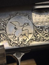 Unique Model 12 Winchester.After Market Grade one engraving.Custom Blond Rollover stock and forend. - 11 of 12