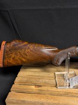 Winchester Model 12, Pigeon Grade 1962,
30 inch barrels with Briley thin walls.,
Highly engraved with lots of gold birds - 20 of 22
