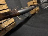 Winchester Model 12, Pigeon Grade 1962,
30 inch barrels with Briley thin walls.,
Highly engraved with lots of gold birds - 9 of 22