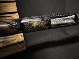 Winchester Model 12, Pigeon Grade 1962,
30 inch barrels with Briley thin walls.,
Highly engraved with lots of gold birds - 11 of 22