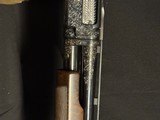 Winchester Model 12, Pigeon Grade 1962,
30 inch barrels with Briley thin walls.,
Highly engraved with lots of gold birds - 17 of 22