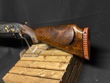 Winchester Model 12, Pigeon Grade 1962,
30 inch barrels with Briley thin walls.,
Highly engraved with lots of gold birds - 4 of 22