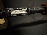 Winchester Model 12, Pigeon Grade 1962,
30 inch barrels with Briley thin walls.,
Highly engraved with lots of gold birds - 12 of 22