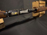 Winchester Model 12, Pigeon Grade 1962,
30 inch barrels with Briley thin walls.,
Highly engraved with lots of gold birds - 10 of 22
