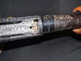 Winchester Model 12, Pigeon Grade 1962,
30 inch barrels with Briley thin walls.,
Highly engraved with lots of gold birds - 14 of 22