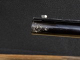 Winchester Model 12, Pigeon Grade 1962,
30 inch barrels with Briley thin walls.,
Highly engraved with lots of gold birds - 8 of 22