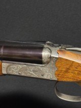 SKB 385 side by side.
20 gauge, 30 inch barrel,
extended choke tubes, like new - 1 of 13