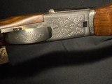 SKB 385 side by side.
20 gauge, 30 inch barrel,
extended choke tubes, like new - 9 of 13