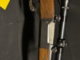 Savage model 99,
.300 Savage caliber with un named scope. - 12 of 20