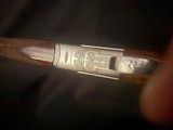 Caeser Guerini, Summit, Nickel reciever, 28 Gauge,
RARE
32 inch barrel.
Like new, factory case. - 13 of 14