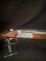 Caeser Guerini, Summit, Nickel reciever, 28 Gauge,
RARE
32 inch barrel.
Like new, factory case. - 10 of 14