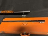 Very nice, Winchester Model 21 ventilated rib two barrel set.
Barrel one is 28 inch mod and full barrel two is 26 inch Ws1 and Ws2.
Case. - 15 of 16