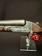 Ithaca 4E, Damascus Barrels,
Completely redone by turnbull.
Mirror bores.