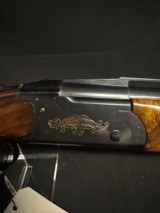 Remington 3200 Competition.
30 inch mod and full.,
Upgrade completed. Minor bluing wear and pitting near the stock. - 12 of 13