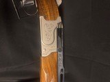 Krieghoff KX5, 34 inch, factory adjustabe comb, adjustable rib and choke tubes.
Factory Case
LIKE NEW - 12 of 13