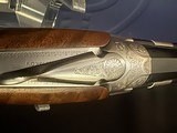 Beretta 687 Silver Pigeon iii, Joel Etchen,
TRAP COMBO,
34/32 barrels,
Nice wood, adjustable comb.
Factory Case
LIKE NEW!! - 8 of 11