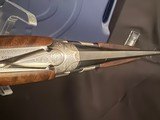 Beretta 687 Silver Pigeon iii, Joel Etchen,
TRAP COMBO,
34/32 barrels,
Nice wood, adjustable comb.
Factory Case
LIKE NEW!! - 9 of 11