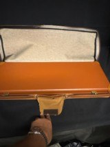 Parker Reproduction, DHE grade, 12 gauge, 2 barrel set, 28 in mod and full, 26 inch I/C and Mod.
Believed to be unfired. - 5 of 25