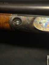 Parker Reproduction, DHE grade, 12 gauge, 2 barrel set, 28 in mod and full, 26 inch I/C and Mod.
Believed to be unfired. - 8 of 25