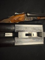 Parker Reproduction, DHE grade, 12 gauge, 2 barrel set, 28 in mod and full, 26 inch I/C and Mod.
Believed to be unfired. - 25 of 25