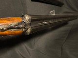 Parker Reproduction, DHE grade, 12 gauge, 2 barrel set, 28 in mod and full, 26 inch I/C and Mod.
Believed to be unfired. - 13 of 25