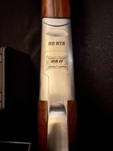 SKB 90HTR, High rib over and under Trap gun.
32 inch - 12 of 13