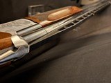 SKB 90HTR, High rib over and under Trap gun.
32 inch - 11 of 13