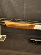 SKB 90HTR, High rib over and under Trap gun.
32 inch - 10 of 13