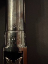 Winchester Model 12, 1918, 20 gauge,
reciever stamped skeet, solid rib, factory No.1 engraving.
VERY NICE!
Thought to be original. - 11 of 18