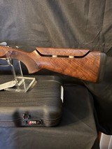 Browning 725, 20 gauge sporting, 32 inch.
Nice assortment of tubes. Negrini Case - 12 of 17