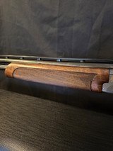 Browning 725, 20 gauge sporting, 32 inch.
Nice assortment of tubes. Negrini Case - 16 of 17