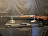 Browning 725, 20 gauge sporting, 32 inch.
Nice assortment of tubes. Negrini Case - 11 of 17