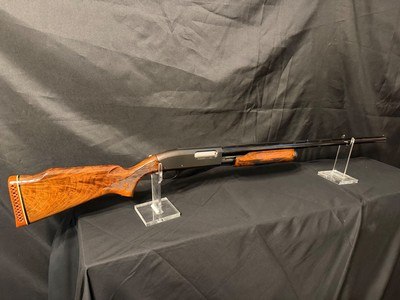 Remington 870 TB, Really nice wood.
30 inch Factory Modified fixed choke barell,
Bill Pierce Porting.