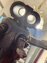 William Beyer Combination side by side,
16 gauge damascus barrel on left, steel rifled .577 on right., horn trigger guard and forened opening lever. - 20 of 25