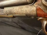 William Beyer Combination side by side,
16 gauge damascus barrel on left, steel rifled .577 on right., horn trigger guard and forened opening lever. - 13 of 25