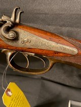 William Beyer Combination side by side,
16 gauge damascus barrel on left, steel rifled .577 on right., horn trigger guard and forened opening lever. - 12 of 25