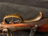 William Beyer Combination side by side,
16 gauge damascus barrel on left, steel rifled .577 on right., horn trigger guard and forened opening lever. - 18 of 25