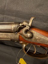 William Beyer Combination side by side,
16 gauge damascus barrel on left, steel rifled .577 on right., horn trigger guard and forened opening lever.