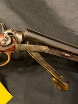William Beyer Combination side by side,
16 gauge damascus barrel on left, steel rifled .577 on right., horn trigger guard and forened opening lever. - 22 of 25