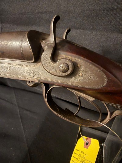 P. Webley and Sons, 10 gauge damascus barrel shotgun with
under lever opening.