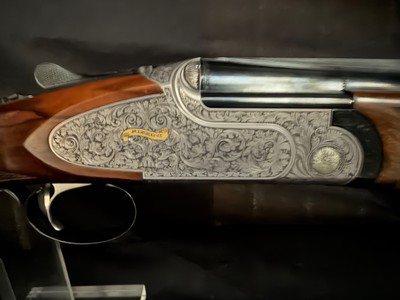 Rizzini Artemis.Beautiful,410, 28 and 20 gauge barrels.Three Forends.Factory case etc.