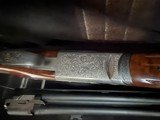 Beretta 687 EELL, 28 inch, two barrel set, 28 inch 20 gauge barrel with mobil chokes,
carrier barrel with kolar tubes. - 11 of 16