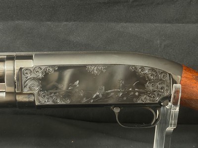 Cutstom engraved Winchester Model 12, Nice wood , sculpted butt plate