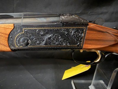 K80 Gold Super Scroll (Blued)30 inch fixed .005 and .005., Broken Target latch,Briley Subgauge tubes and Briley Ameri Case.Like New