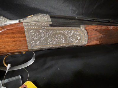 Krieghoff K80, Gold Super Scroll (Silver) 32 inch PARCOUR barrel with thin wall briley c/ts, Excellent Condition.