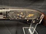 Winchester Model 12, Custom engraved in Angelo Bee Style., Many gold inlays and silver border.30 inch full. - 1 of 12