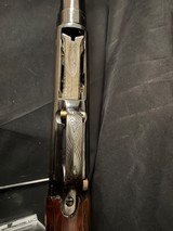 Winchester Model 12, Custom engraved in Angelo Bee Style., Many gold inlays and silver border.30 inch full. - 8 of 12